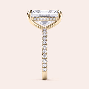 Elegant yellow gold engagement ring with radiant-cut diamond and intricatePave setting, available in 14K, 18K, or platinum.