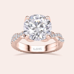 Radiant cut diamond engagement ring in 14K rose gold with pave band, perfect for timeless elegance and sparkle.