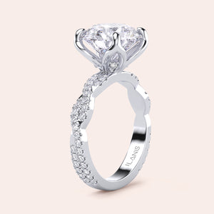 Radiant cut diamond engagement ring in 14K or 18K white gold or platinum with Pave diamond band, front view.