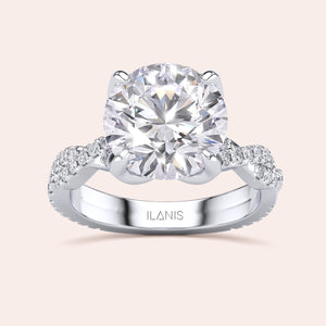 Radiant cut diamond engagement ring in 14K or 18K white gold or platinum with Pave diamond band, front view.