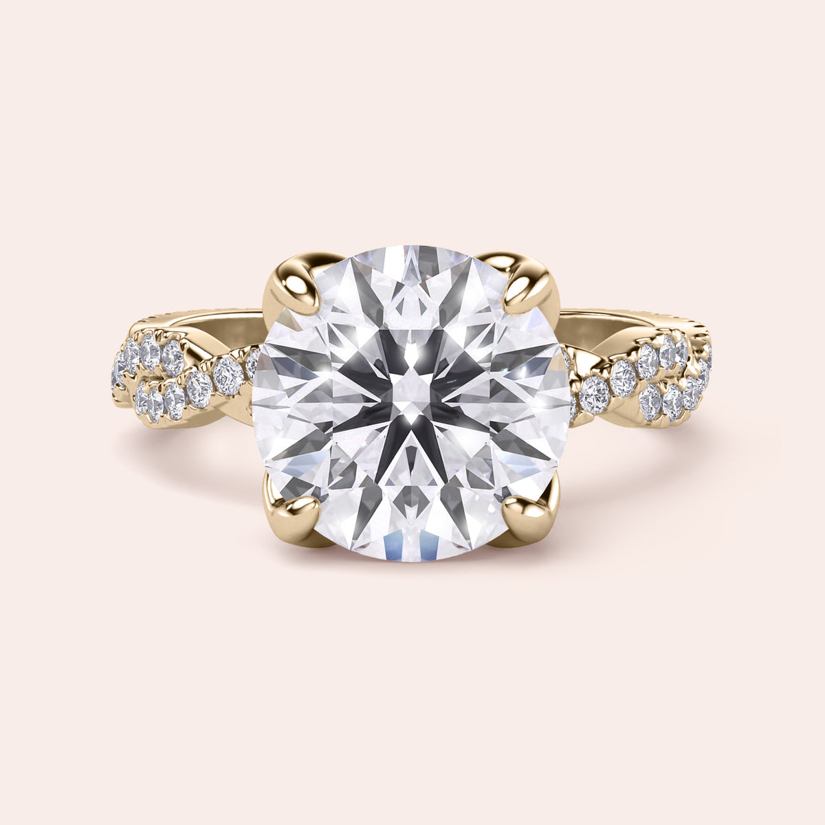 Radiant-cut diamond engagement ring with side stone accents in 14K yellow gold, displayed on a neutral background.