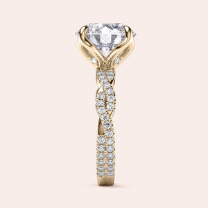 Radiant-cut diamond engagement ring with side stone accents in 14K yellow gold, displayed on a neutral background.