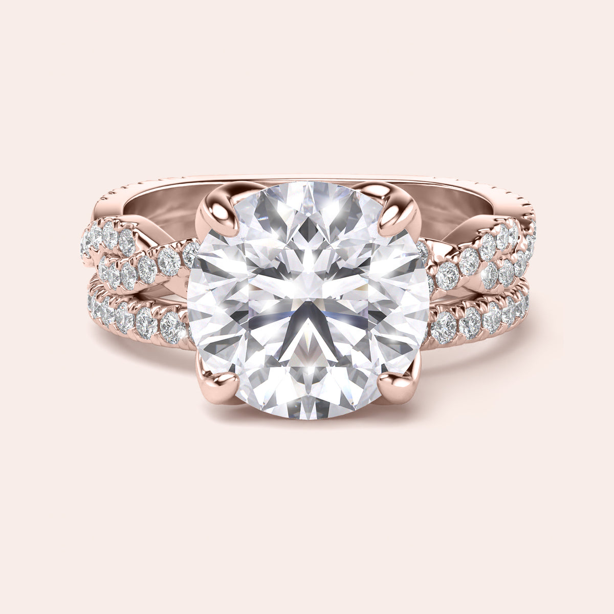 Rose gold teardrop halo engagement ring set featuring pear-shaped diamond, with options in 14K, 18K, or platinum settings.