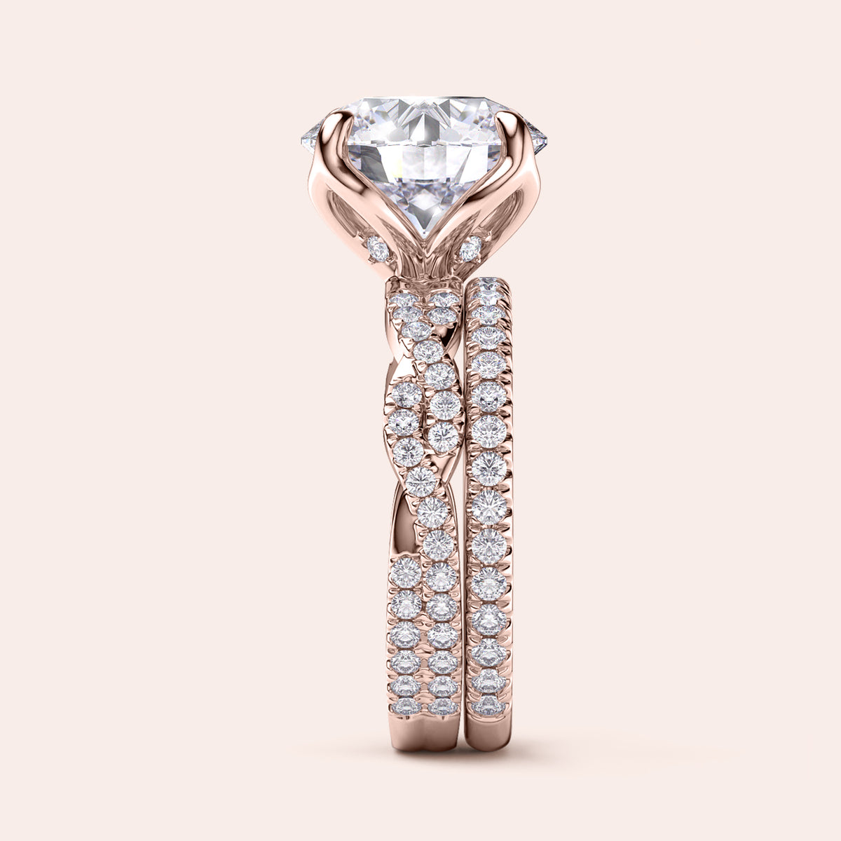 Rose gold teardrop halo engagement ring set featuring pear-shaped diamond, with options in 14K, 18K, or platinum settings.