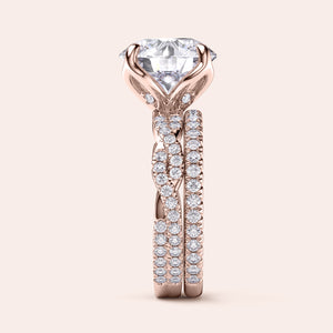 Rose gold teardrop halo engagement ring set featuring pear-shaped diamond, with options in 14K, 18K, or platinum settings.