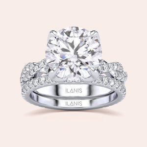 Radiant cut diamond engagement ring in 14K or 18K white gold or platinum with Pave diamond band, front view.
