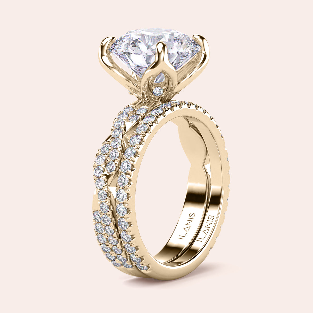Radiant-cut diamond engagement ring with side stone accents in 14K yellow gold, displayed on a neutral background.