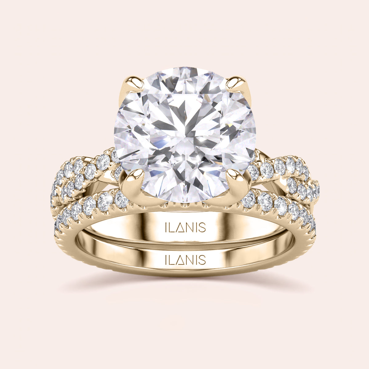 Radiant-cut diamond engagement ring with side stone accents in 14K yellow gold, displayed on a neutral background.