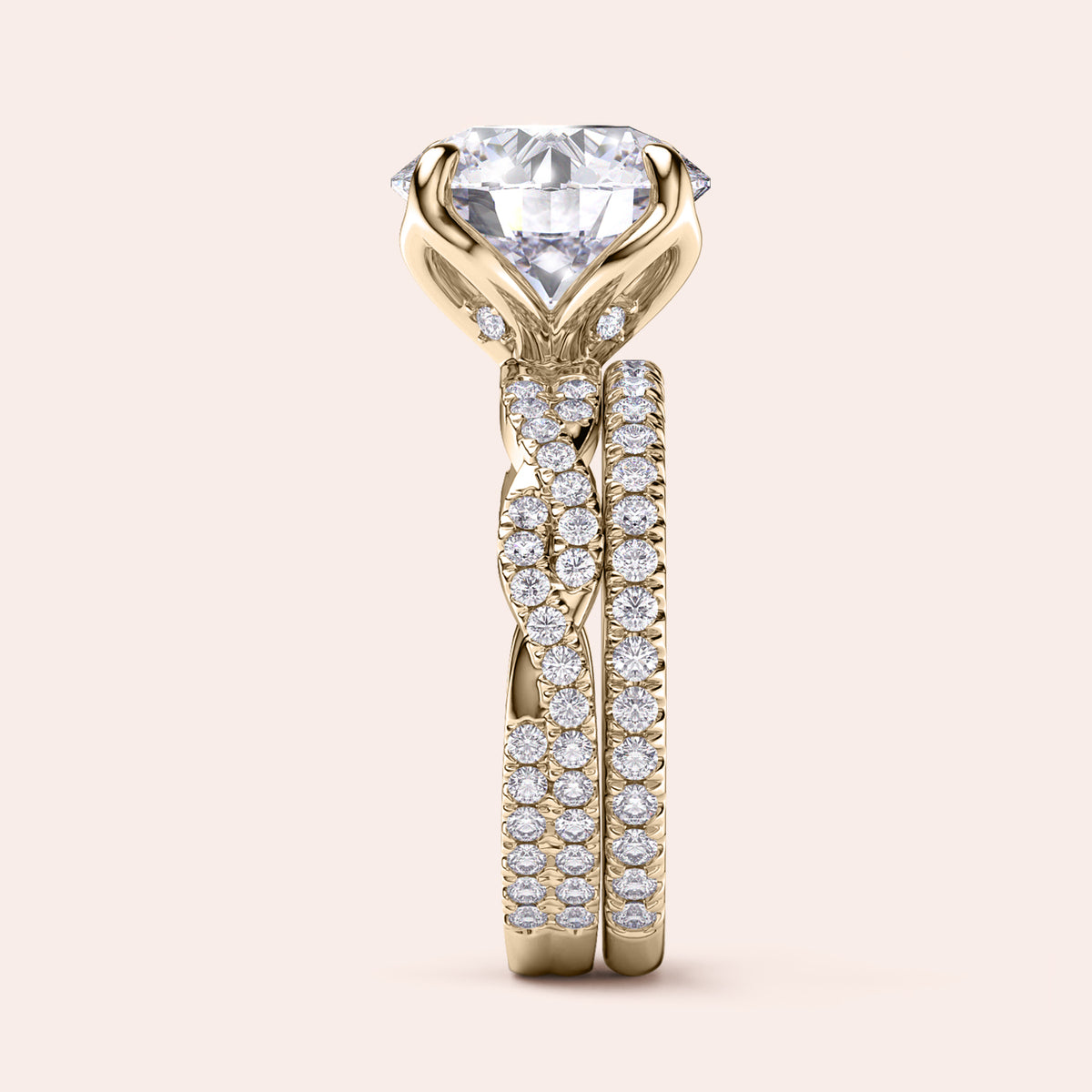 Radiant-cut diamond engagement ring with side stone accents in 14K yellow gold, displayed on a neutral background.