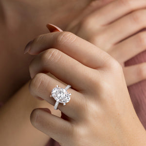 Radiant cut diamond engagement ring in 14K or 18K white gold or platinum with Pave diamond band, front view.