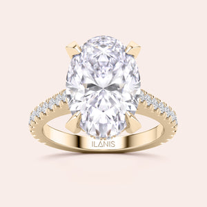 Radiant-cut diamond engagement ring with side stone accents in 14K yellow gold, displayed on a neutral background.