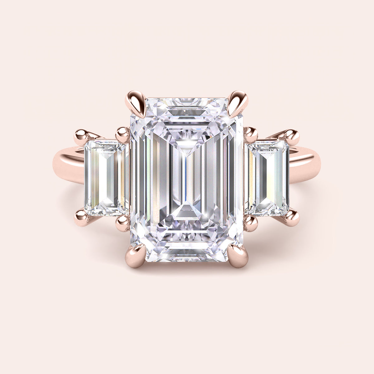 Rose gold teardrop halo engagement ring set featuring pear-shaped diamond, with options in 14K, 18K, or platinum settings.
