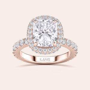 Rose gold teardrop halo engagement ring set featuring pear-shaped diamond, with options in 14K, 18K, or platinum settings.