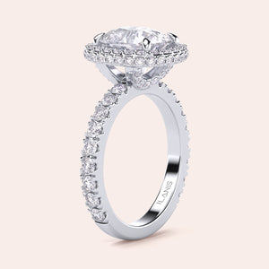 Radiant cut diamond engagement ring in 14K or 18K white gold or platinum with Pave diamond band, front view.