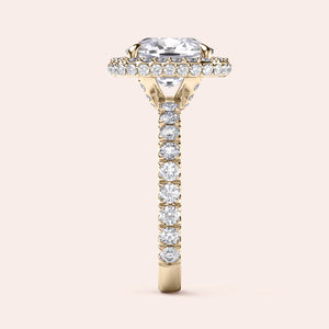 Radiant-cut diamond engagement ring with side stone accents in 14K yellow gold, displayed on a neutral background.