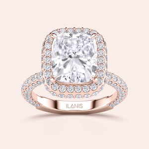 Rose gold teardrop halo engagement ring set featuring pear-shaped diamond, with options in 14K, 18K, or platinum settings.