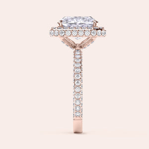 Rose gold teardrop halo engagement ring set featuring pear-shaped diamond, with options in 14K, 18K, or platinum settings.