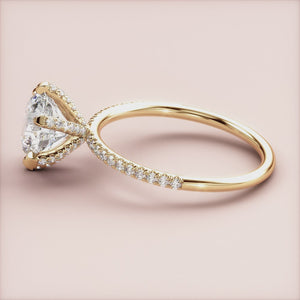 Elegant 14K gold engagement ring featuring a stunning round diamond with pave accents, perfect for your special moment.