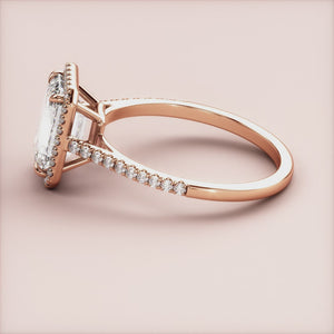 Elegant 14K rose gold emerald-cut diamond engagement ring with a dazzling halo, perfect for timeless sophistication.