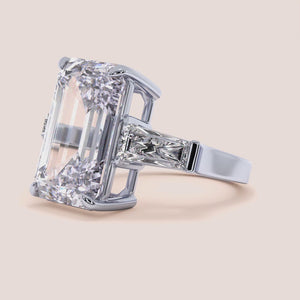 14K white gold pear-shaped engagement ring with hidden halo accents and 3D pave design, perfect for romantic proposals. 