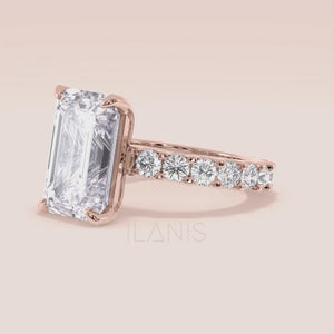 Emerald cut diamond engagement ring rose gold with full eternity diamond band, side profile view, modern hidden setting, luxury bridal ring design 
