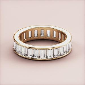 14K Yellow Gold Eternity Band with Baguette-Cut Diamonds, perfect for weddings and special occasions. 