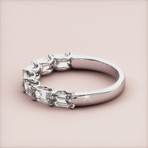 Elegant emerald-cut diamond wedding band in 14K or 18K white gold or platinum, featuring baguette-cut diamonds for timeless beauty. 