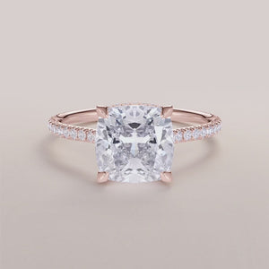 "Elegant 14K Rose Gold engagement ring featuring a sky cushion cut with an invisible gallery, hidden halo, and pave band.