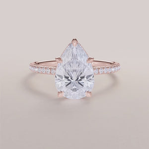 Exquisite rose gold engagement ring with elongated hexagonal diamond,Pave band, available in 14K, 18K, or platinum.