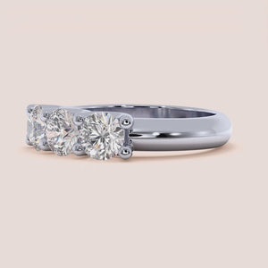Elegant 14K/18K white gold three stone U-prong wedding band, featuring exquisite craftsmanship, ideal for celebrations of love. 