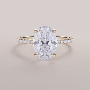 Yellow Gold 14K & 18K oval engagement ring with invisible gallery, hidden halo, and pave band - exquisite craftsmanship and elegance.