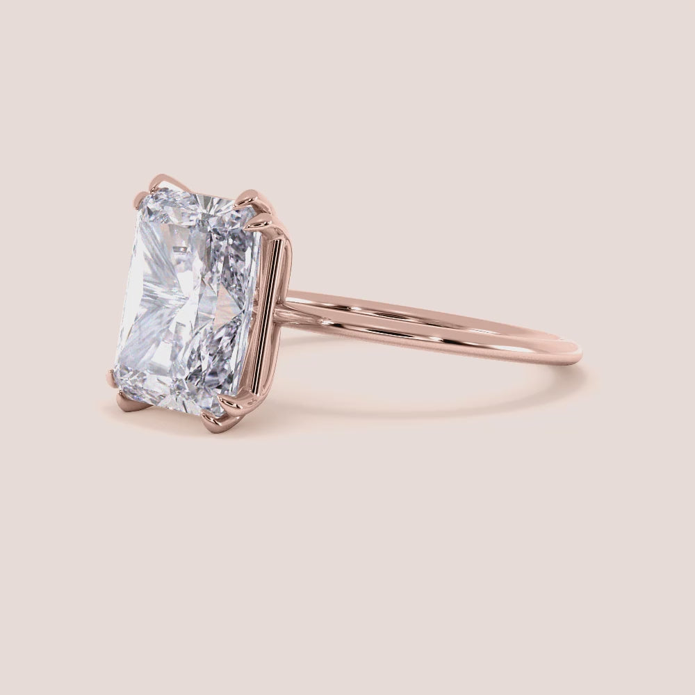Radiant cut diamond ring set in 14K gold, featuring exquisite design and sparkle for ultimate elegance. |



#14KRecycledRoseGold #18KRecycledRoseGold


