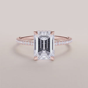 "14K Rose Gold Phoebus Emerald Engagement Ring with Hidden Halo and Pave Band, a stunning choice for timeless elegance.