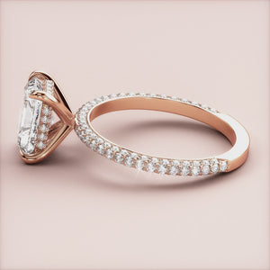 Elegant 14K Rose Gold engagement ring with oval-cut diamond and pave setting, symbolizing timeless love and luxury.
