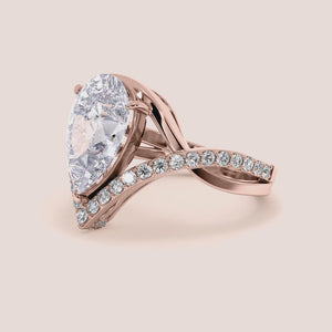 Elegant 14K rose gold diamond engagement ring with round brilliant center stone and intertwining diamond band, perfect for proposals.