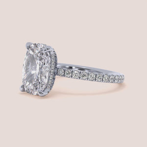 14K 18K white gold engagement ring featuring a marquise-cut diamond and pave setting, exuding timeless luxury and elegance.
