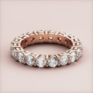 Stunning 14K/18K Rose Gold wedding band with round brilliant diamonds in prong setting, perfect for any special occasion. 