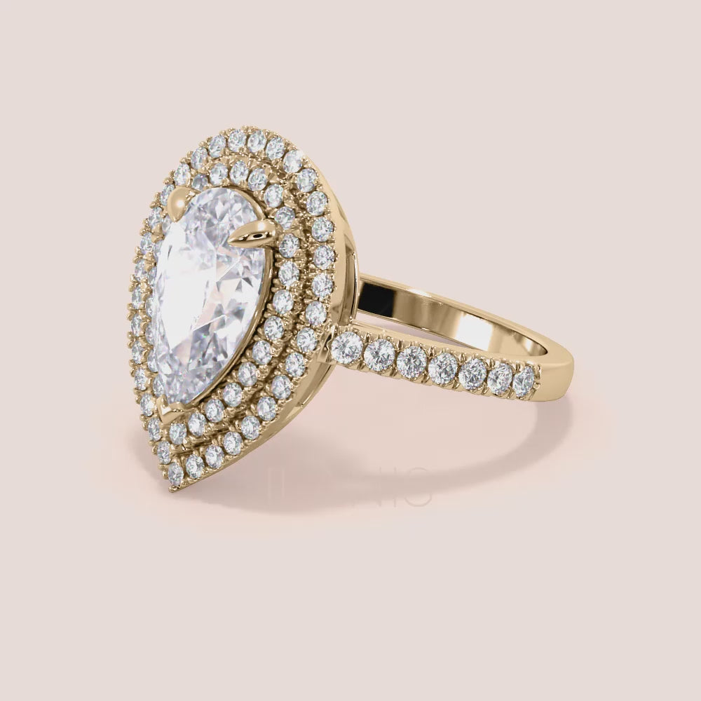 Pear shaped diamond engagement ring yellow gold with double halo and pavé band, side profile view, elevated hidden setting, luxury bridal ring | #14KRecycledYellowGold #18KRecycledYellowGold