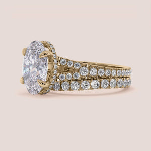 """14K yellow gold oval split shank hidden halo engagement ring from the Zara set, elegantly designed for timeless romance.""