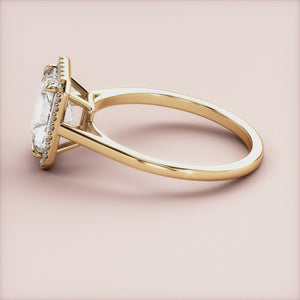 "14K yellow gold Neoma radiant halo cathedral engagement ring, showcasing elegance and brilliance for a timeless love.
