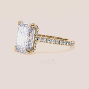 Vertical side view of yellow gold radiant cut diamond engagement ring with pavé band, showcasing craftsmanship, structure and fine diamond setting 