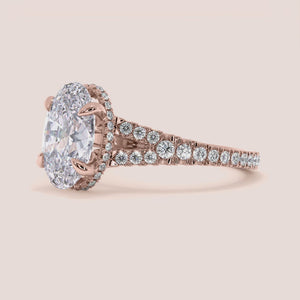 "Rose Gold 14K engagement ring featuring an oval split shank and hidden halo, perfect for timeless elegance and sophistication.