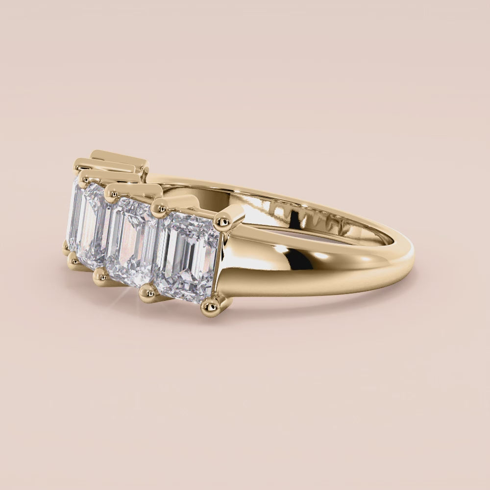Elegant yellow gold five-stone emerald-cut wedding band in 14K or 18K, featuring sparkling diamonds in a classic prong setting. |
 
 
 #14KRecycledYellowGold
 #18KRecycledYellowGold