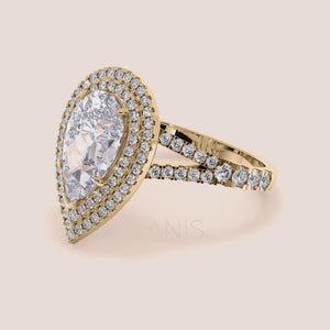 Sophisticated yellow gold engagement ring featuring a central cushion-cut diamond framed by a double row of micro-pave diamonds on the band, enhancing its luxurious appeal. #14KRecycledYellowGold #18KRecycledYellowGold