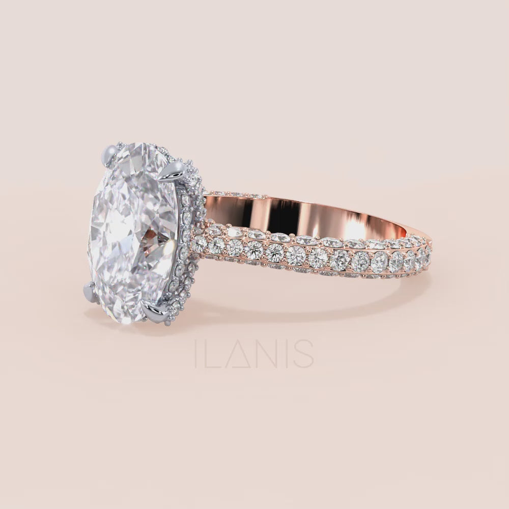 Video of Oval diamond engagement ring in two tone rose and white gold, with pavé band and hidden halo detail | #14KRecycledRose/WhiteGold #18KRecycledRose/WhiteGold