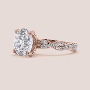 Radiant cut diamond engagement ring in 14K rose gold with pave band, perfect for timeless elegance and sparkle.
