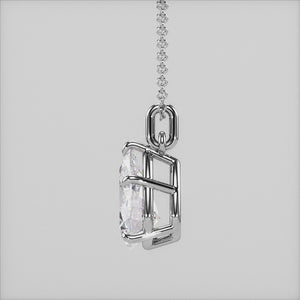 A detailed video of a pear-shaped diamond pendant in white gold, showcasing its stunning craftsmanship and delicate basket setting that allows for optimal light reflection.
