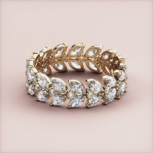 Exquisite 14K and 18K gold marquise two-row eternity wedding band featuring brilliant diamonds, perfect for timeless elegance. 