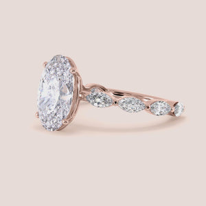 Elegant rose gold engagement ring in 14K/18K or platinum, showcasing a large marquise-cut diamond and an eternity band of marquise diamonds.