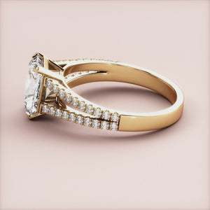 14K yellow gold Danica radiant cathedral split shank pave band engagement ring, perfect for a timeless proposal.